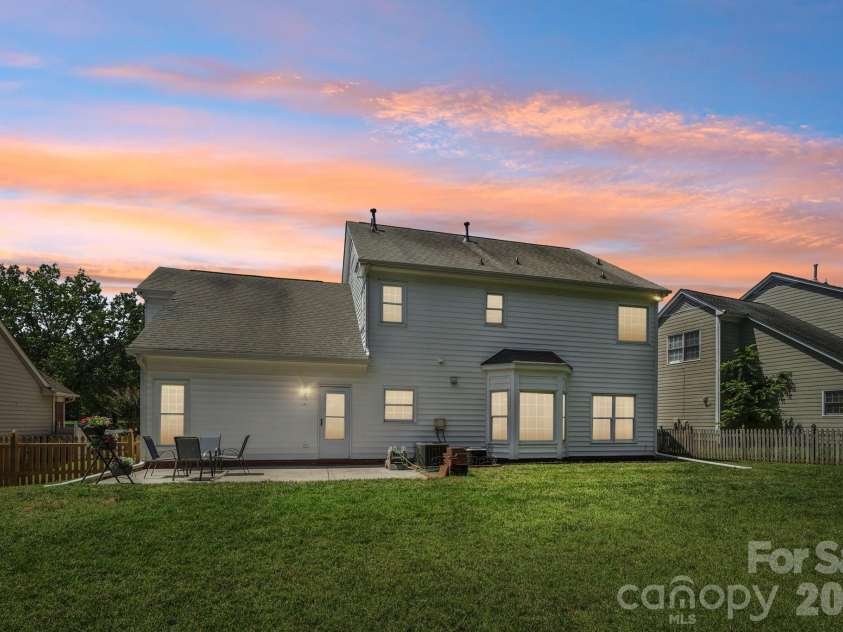 8504 Tamarron Drive, Charlotte, NC 28277.  MLS# CAR4415545, YatesRealty ID 46326. Fenced yard backs to HOA owned land.