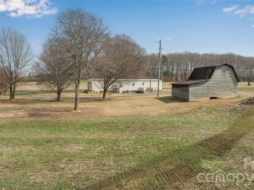 5750 New Hope Road, Denton, NC 27239.  MLS# CAR4350091, YatesRealty ID 4633. Back of Property