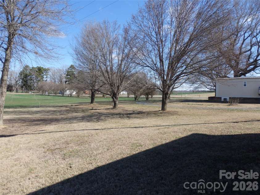 5750 New Hope Road, Denton, NC 27239.  MLS# CAR4350091, YatesRealty ID 4633. Back yard