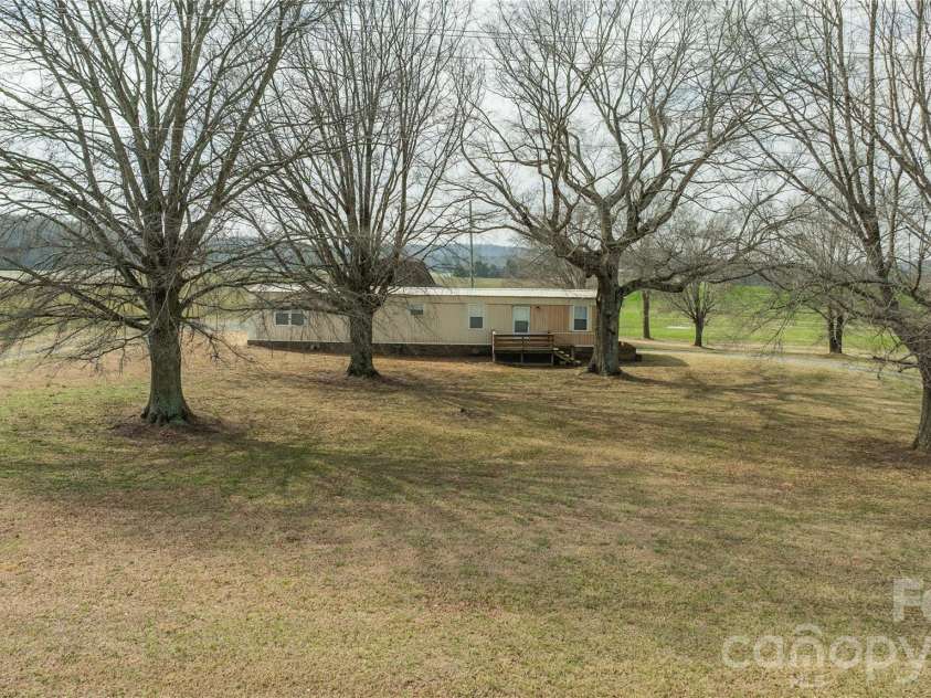 5750 New Hope Road, Denton, NC 27239.  MLS# CAR4350091, YatesRealty ID 4633. Front yard