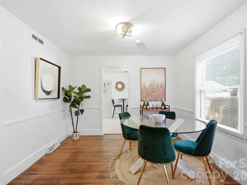 1506 Coker Avenue, Charlotte, NC 28208.  MLS# CAR4415832, YatesRealty ID 46337. Spacious dining room great for entertaining!