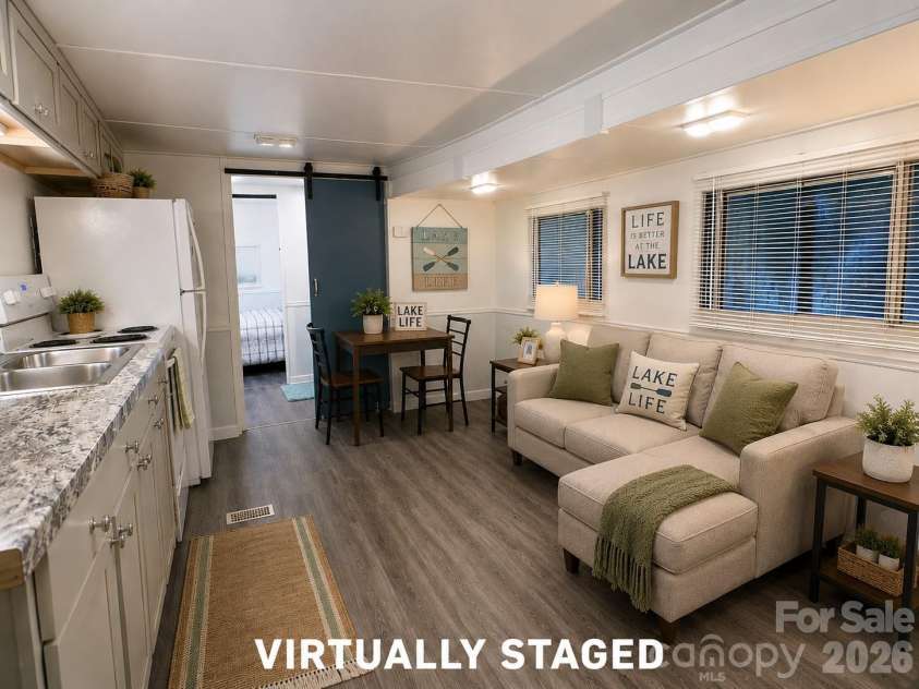 200 Badin View Road, New London, NC 28127.  MLS# CAR4351742, YatesRealty ID 4635. OR Request an empty camper and Create your Own Space