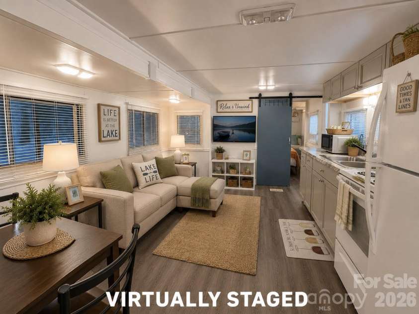 200 Badin View Road, New London, NC 28127.  MLS# CAR4351742, YatesRealty ID 4635. OR Request an empty camper and Create your Own Space