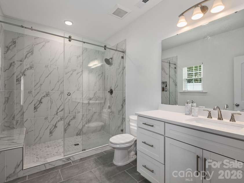 26 Walnut Springs Drive, Asheville, NC 28804.  MLS# CAR4344812, YatesRealty ID 4635. Spa-Like Primary Bath 