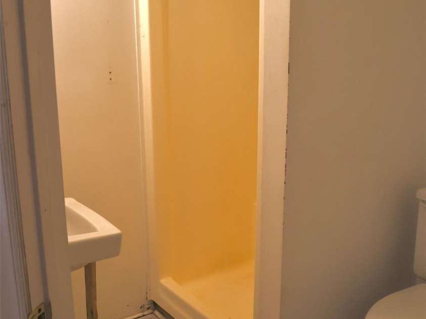 2629 Commonwealth Avenue, Charlotte, NC 28205.  MLS# CAR4295846, YatesRealty ID 46357. Bath in garage apt. down