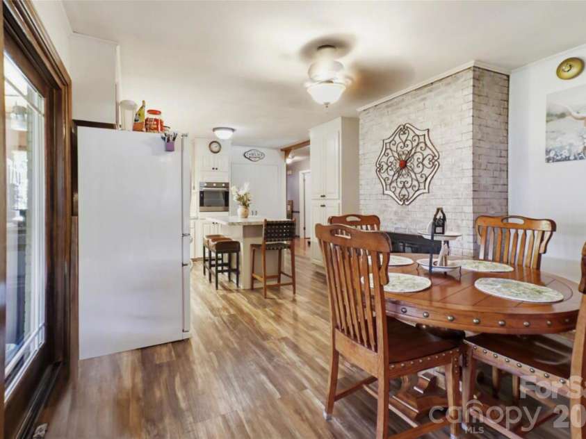 724 Hillcrest Drive, Bessemer City, NC 28016.  MLS# CAR4417402, YatesRealty ID 46359. The dining area flows effortlessly into the kitchen, creating an open, connected space that feels perfect for both everyday meals and entertaining. With plenty of room for a generous dining table and easy access to