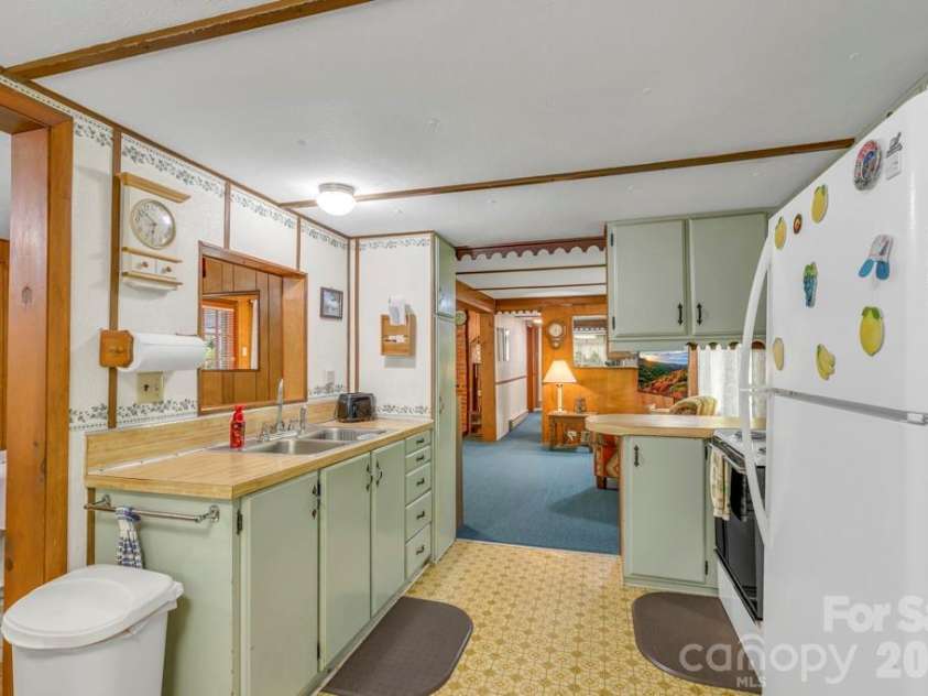 2850 Henson Creek Road, Newland, NC 28657.  MLS# CAR4417420, YatesRealty ID 46360. 