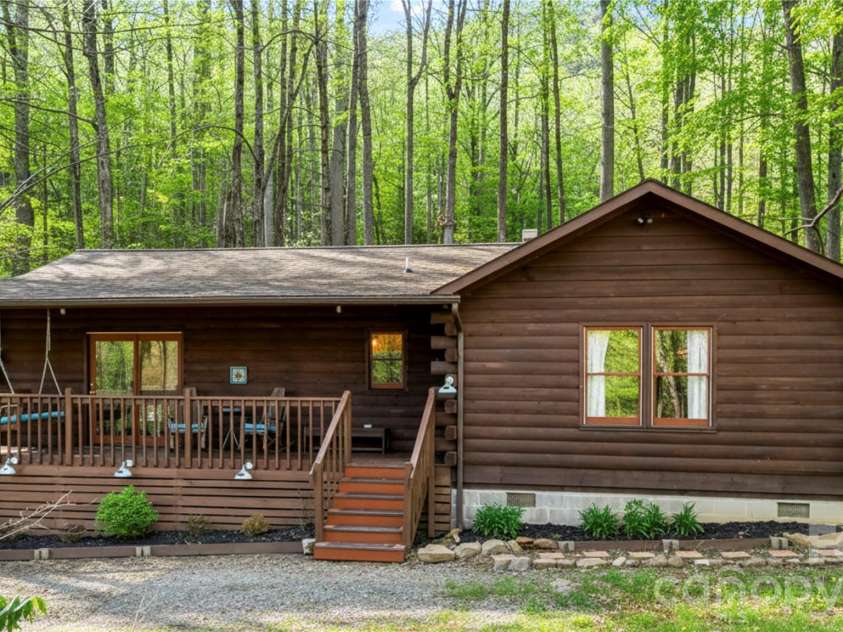 398 Locust Drive, Maggie Valley, NC 28751.  MLS# CAR4416894, YatesRealty ID 46368. Covered Porch