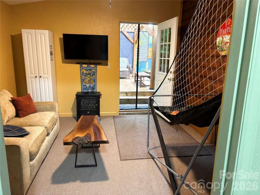 398 Locust Drive, Maggie Valley, NC 28751.  MLS# CAR4416894, YatesRealty ID 46368. Game room or flex space
