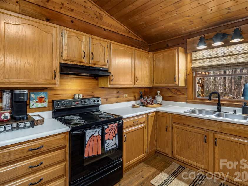 398 Locust Drive, Maggie Valley, NC 28751.  MLS# CAR4416894, YatesRealty ID 46368. Large kitchen