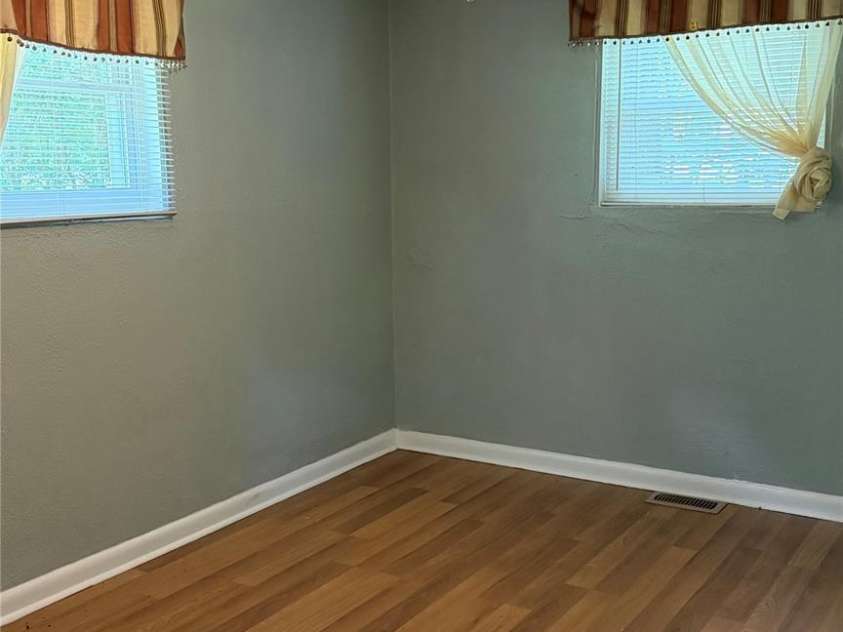 216 Auten Circle, Mount Holly, NC 28120.  MLS# CAR4416875, YatesRealty ID 46378. Front bedroom