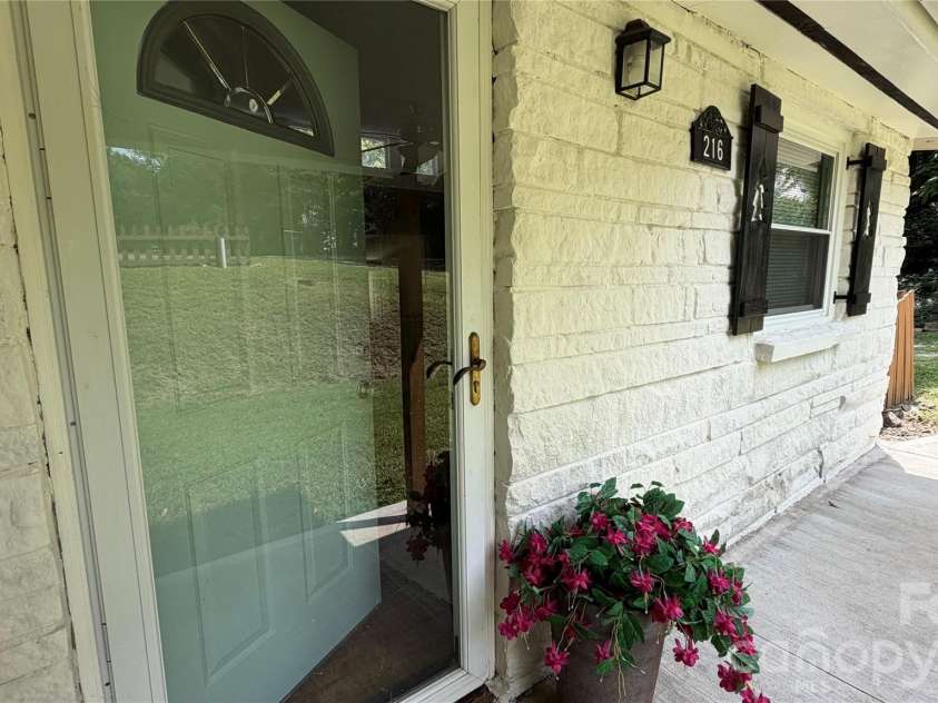 216 Auten Circle, Mount Holly, NC 28120.  MLS# CAR4416875, YatesRealty ID 46378. Front door has a covered porch