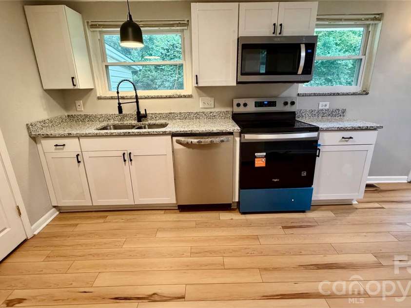 216 Auten Circle, Mount Holly, NC 28120.  MLS# CAR4416875, YatesRealty ID 46378. New range, microwave, dishwasher