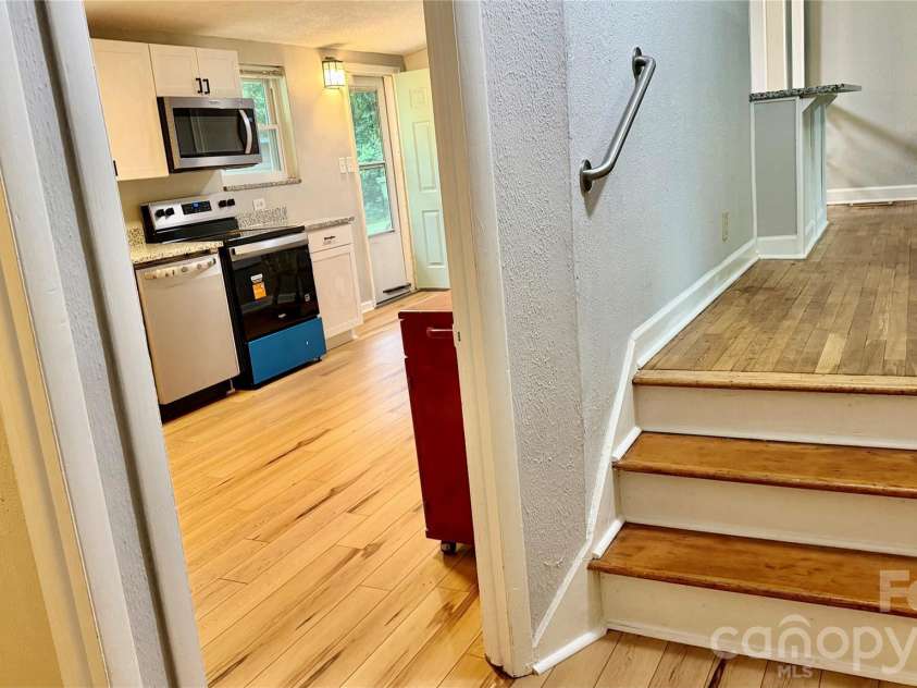 216 Auten Circle, Mount Holly, NC 28120.  MLS# CAR4416875, YatesRealty ID 46378. Unique floor plan features a three-step transition between the living area and the kitchen, bath, laundry and second bedroom