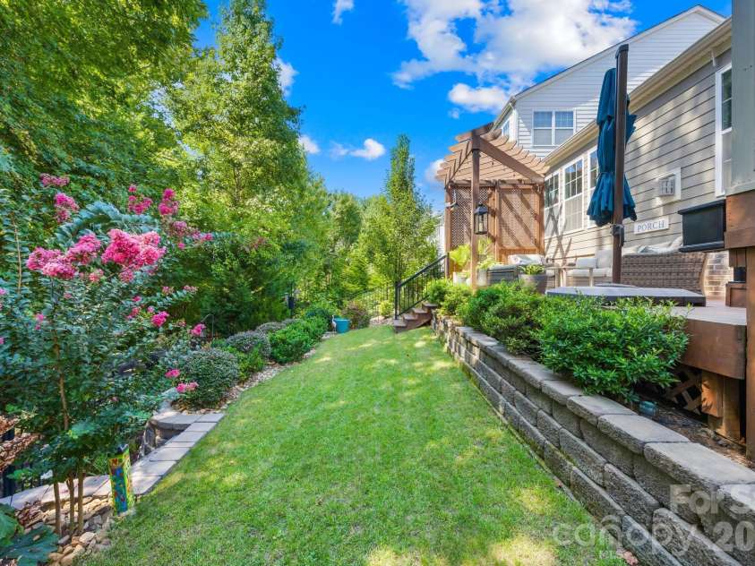 198 Rustling Waters Drive, Mooresville, NC 28117.  MLS# CAR4415930, YatesRealty ID 46382. Backyard