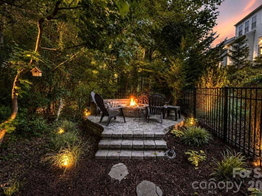 198 Rustling Waters Drive, Mooresville, NC 28117.  MLS# CAR4415930, YatesRealty ID 46382. Fire pit