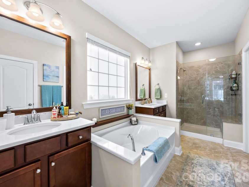 198 Rustling Waters Drive, Mooresville, NC 28117.  MLS# CAR4415930, YatesRealty ID 46382. Primary Bathroom