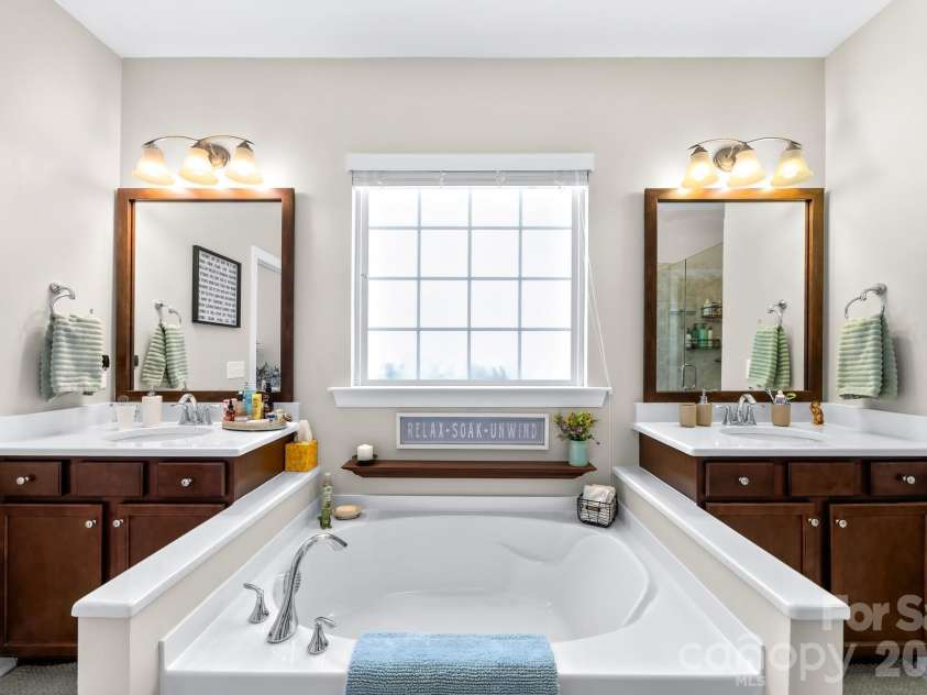 198 Rustling Waters Drive, Mooresville, NC 28117.  MLS# CAR4415930, YatesRealty ID 46382. Primary Bathroom