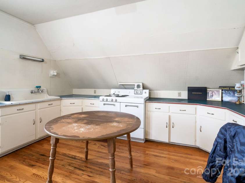 3 Elliott Drive, Thomasville, NC 27360.  MLS# CAR4229217, YatesRealty ID 4639. Bedroom on 2nd level (has sink & oven)