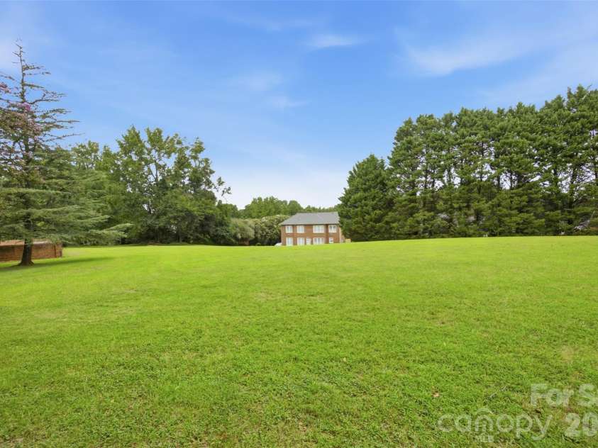 1511 Prancer Lane, Gastonia, NC 28056.  MLS# CAR4412780, YatesRealty ID 46391. Enormous back yard / game field