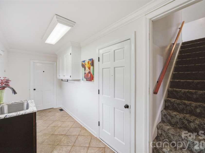1511 Prancer Lane, Gastonia, NC 28056.  MLS# CAR4412780, YatesRealty ID 46391. Laundry/mudroom with 2nd staircase to bonus room