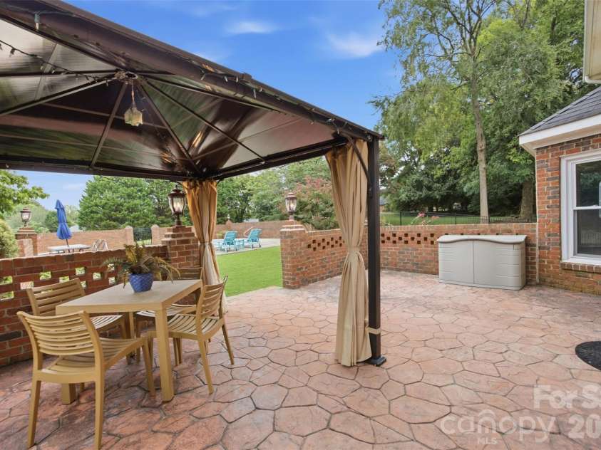 1511 Prancer Lane, Gastonia, NC 28056.  MLS# CAR4412780, YatesRealty ID 46391. Raised patio