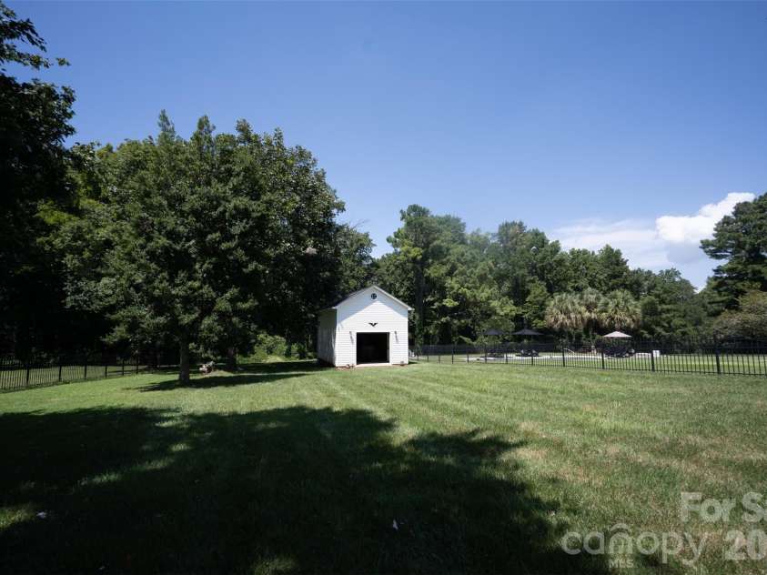 115 Providence Place, York, SC 29745.  MLS# CAR4390448, YatesRealty ID 46394. Detached garage, properety line are trees
