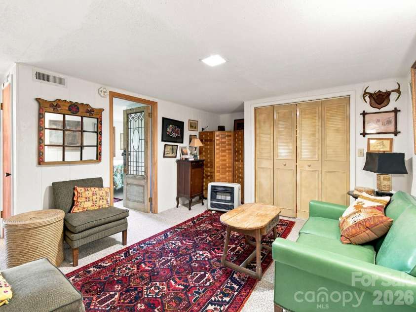 327 Summit Road, Tryon, NC 28782.  MLS# CAR4417439, YatesRealty ID 46395. Basement bonus room