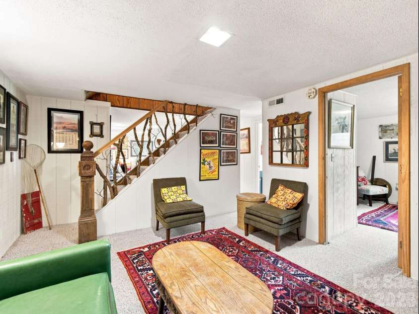 327 Summit Road, Tryon, NC 28782.  MLS# CAR4417439, YatesRealty ID 46395. Bedroom is through the doorway on the right