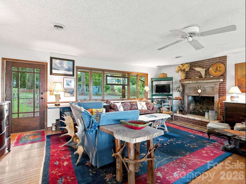 327 Summit Road, Tryon, NC 28782.  MLS# CAR4417439, YatesRealty ID 46395. Filled with unique treasures