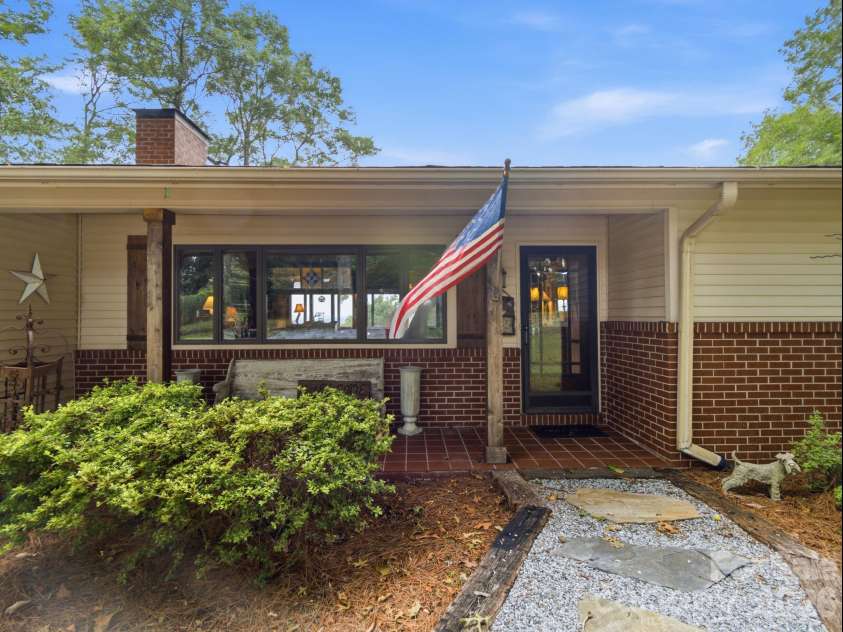 327 Summit Road, Tryon, NC 28782.  MLS# CAR4417439, YatesRealty ID 46395. Front entrance