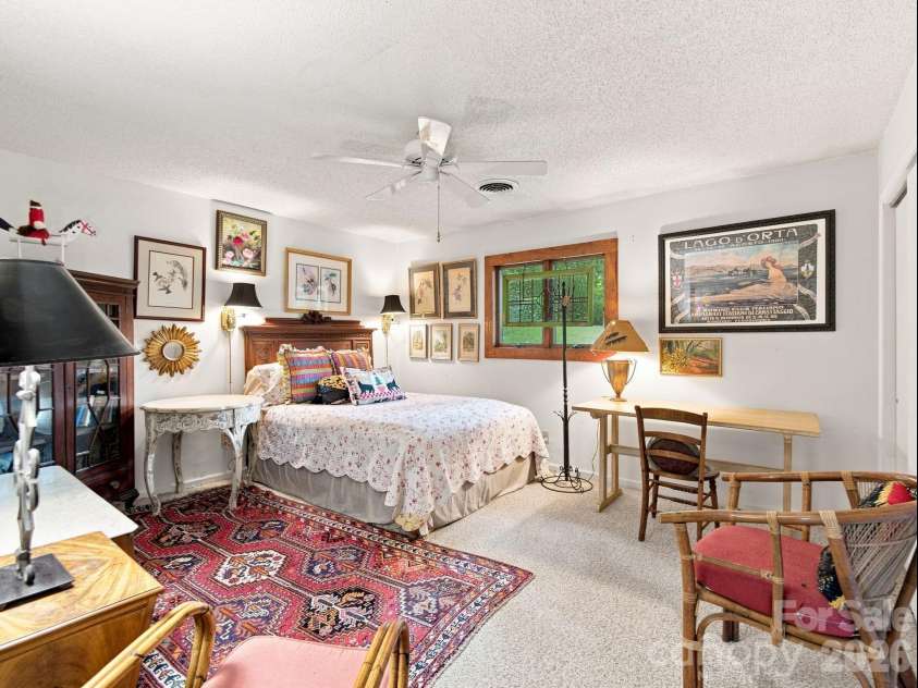 327 Summit Road, Tryon, NC 28782.  MLS# CAR4417439, YatesRealty ID 46395. Guest bedroom on the main level