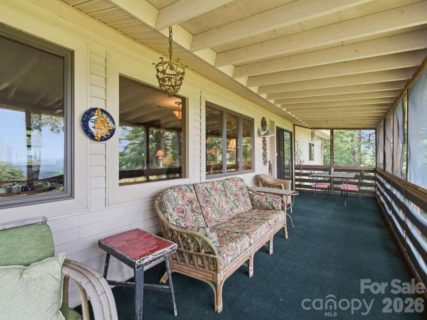 327 Summit Road, Tryon, NC 28782.  MLS# CAR4417439, YatesRealty ID 46395. Lounging and dining space