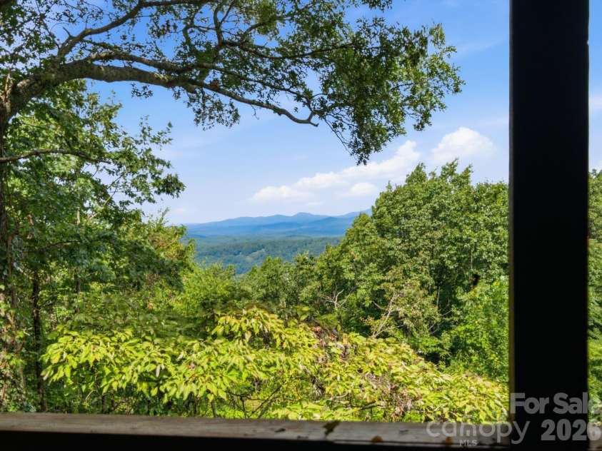 327 Summit Road, Tryon, NC 28782.  MLS# CAR4417439, YatesRealty ID 46395. Mountain breezes
