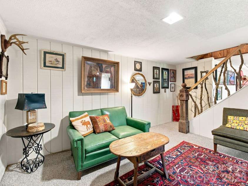 327 Summit Road, Tryon, NC 28782.  MLS# CAR4417439, YatesRealty ID 46395. One of many unique features includes the stair railing