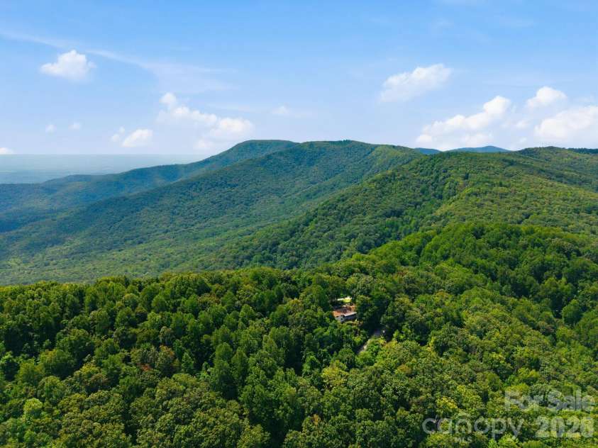327 Summit Road, Tryon, NC 28782.  MLS# CAR4417439, YatesRealty ID 46395. Retreat to Melrose Mountain