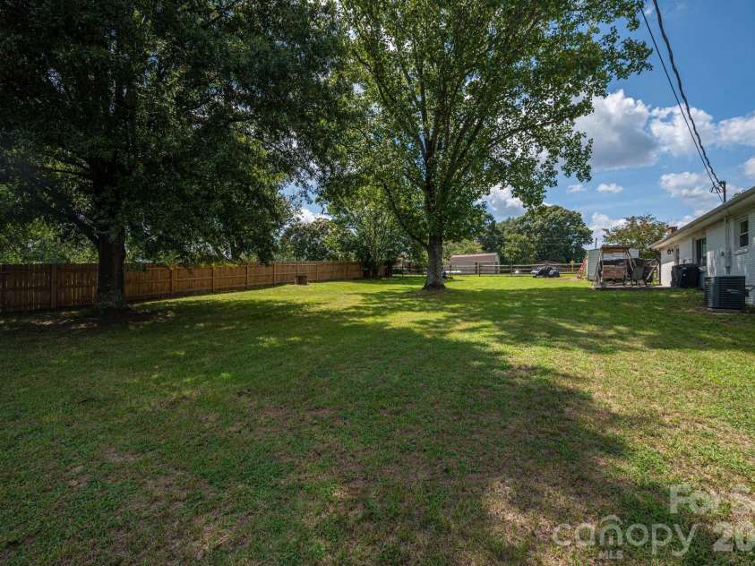 1718 Woolie Road, Lincolnton, NC 28092.  MLS# CAR4417317, YatesRealty ID 46404. Large back yard