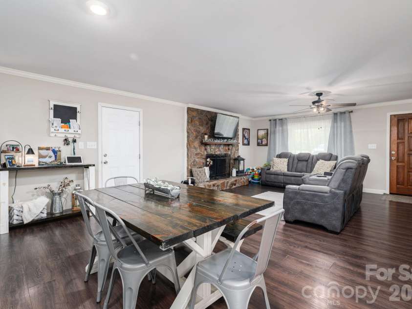 1718 Woolie Road, Lincolnton, NC 28092.  MLS# CAR4417317, YatesRealty ID 46404. Looking from kitchen toward living area