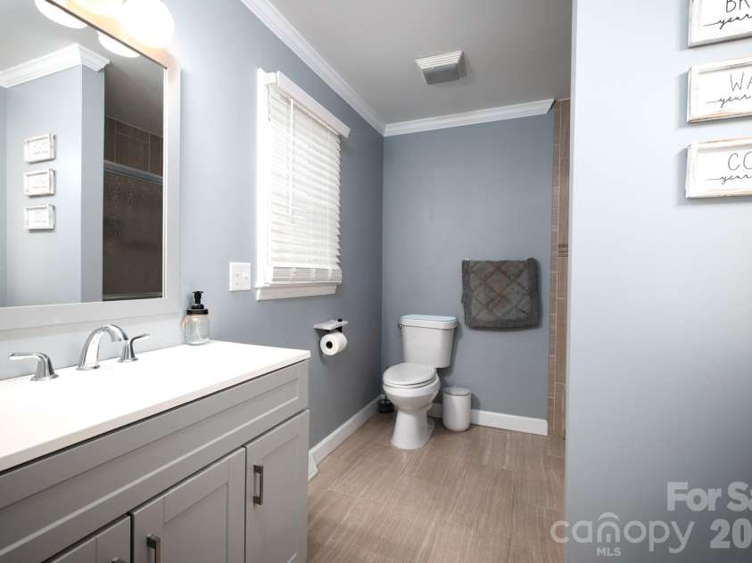 1718 Woolie Road, Lincolnton, NC 28092.  MLS# CAR4417317, YatesRealty ID 46404. Primary bathroom with walk in shower