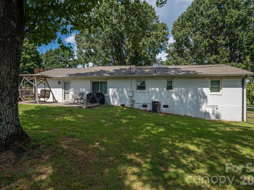 1718 Woolie Road, Lincolnton, NC 28092.  MLS# CAR4417317, YatesRealty ID 46404. Shaded area in back yard