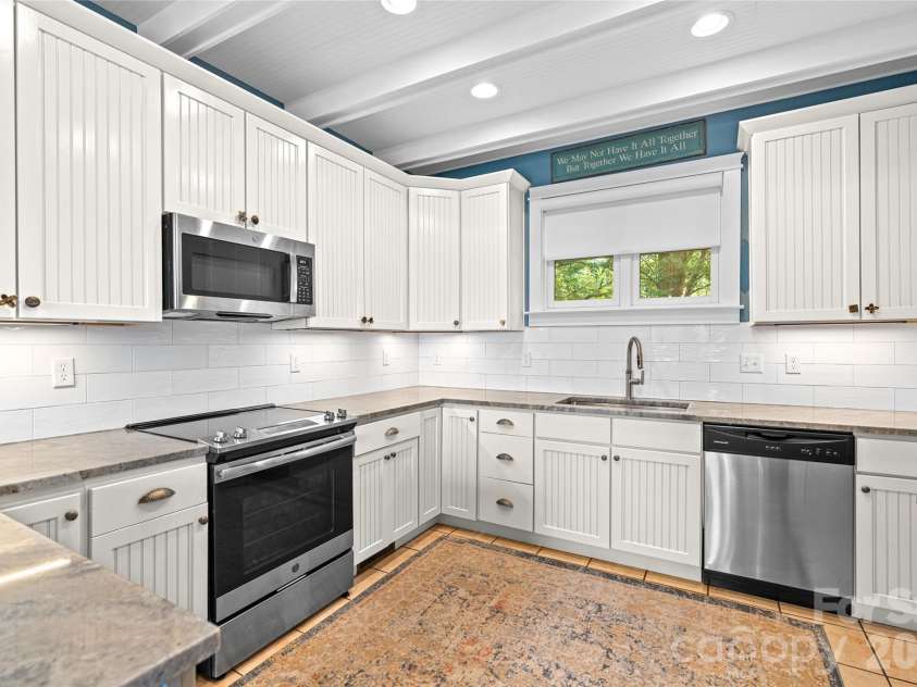 45 Logan Circle, Asheville, NC 28806.  MLS# CAR4415397, YatesRealty ID 46405. A bright, welcoming kitchen designed for entertaining and everyday moments.