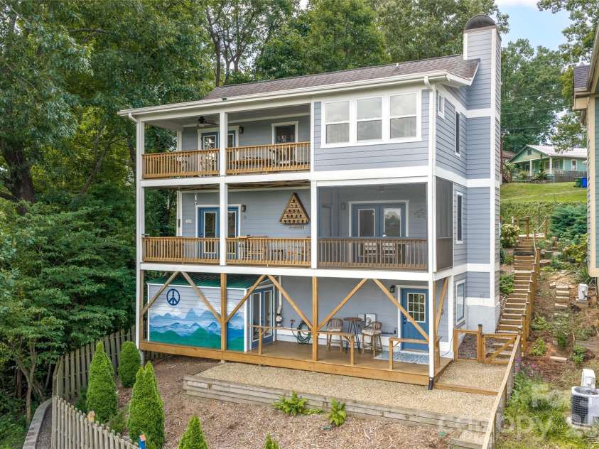 45 Logan Circle, Asheville, NC 28806.  MLS# CAR4415397, YatesRealty ID 46405. Expansive outdoor living with a deck on every level.