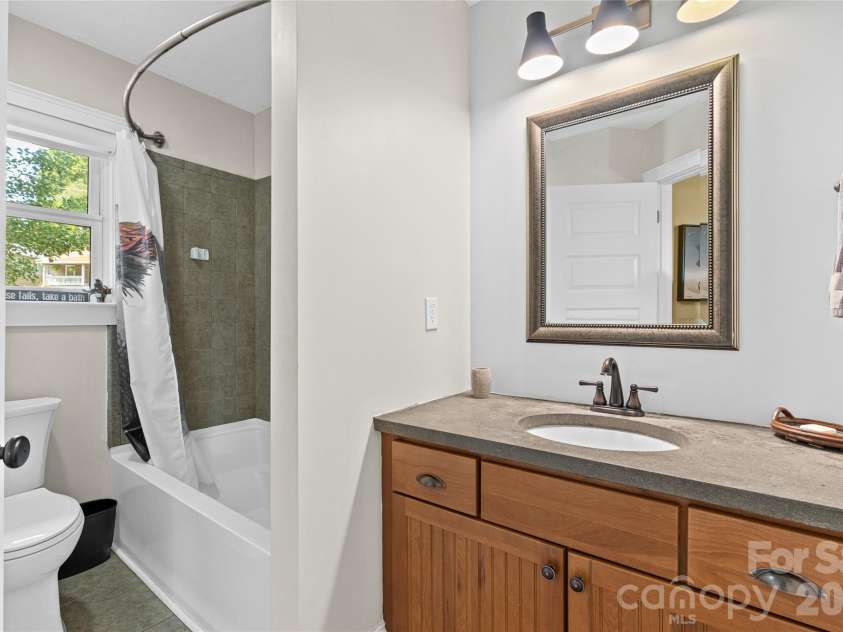 45 Logan Circle, Asheville, NC 28806.  MLS# CAR4415397, YatesRealty ID 46405. Full guest bathroom.