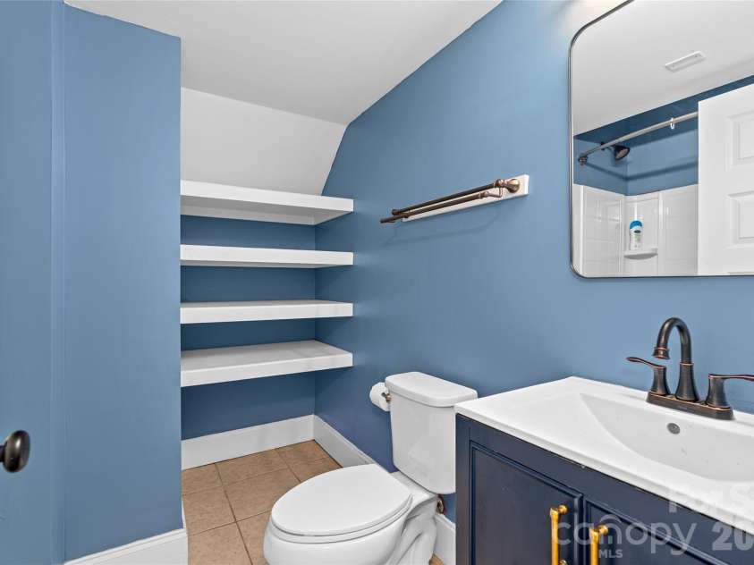 45 Logan Circle, Asheville, NC 28806.  MLS# CAR4415397, YatesRealty ID 46405. Full lower-level bathroom.