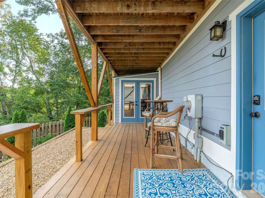 45 Logan Circle, Asheville, NC 28806.  MLS# CAR4415397, YatesRealty ID 46405. Private fenced backyard with covered deck and storage.