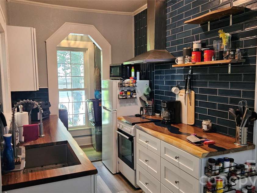607 3rd Street, Spencer, NC 28159.  MLS# CAR4408591, YatesRealty ID 46408. Kitchen