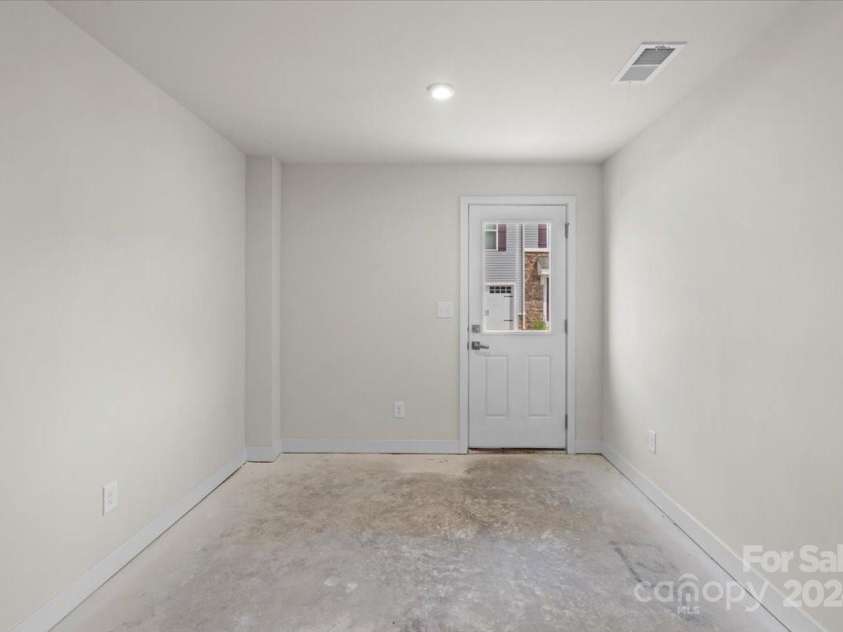 1725 Aspire Street, Charlotte, NC 28262.  MLS# CAR4205926, YatesRealty ID 4642. Flex space! Just needs flooring