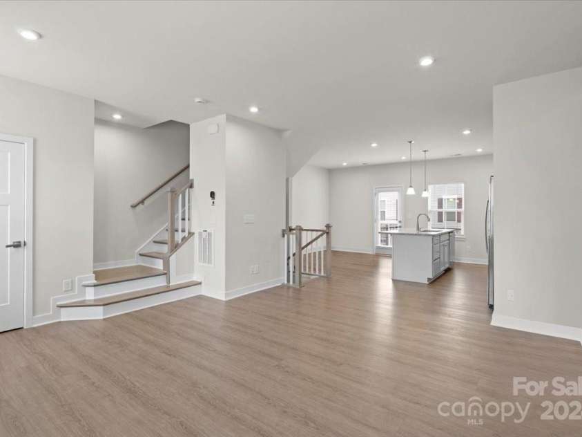 1725 Aspire Street, Charlotte, NC 28262.  MLS# CAR4205926, YatesRealty ID 4642. Kitchen and living on second story