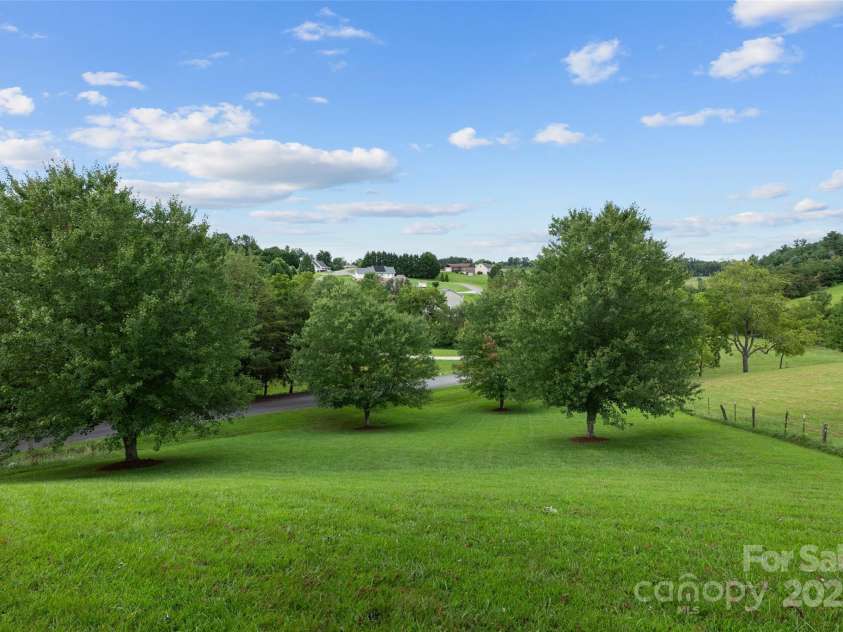271 Breton Ridge Road, Leicester, NC 28748.  MLS# CAR4284121, YatesRealty ID 4642. Front yard