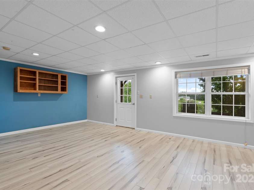 271 Breton Ridge Road, Leicester, NC 28748.  MLS# CAR4284121, YatesRealty ID 4642. Lower Level Flex Space/Living Area